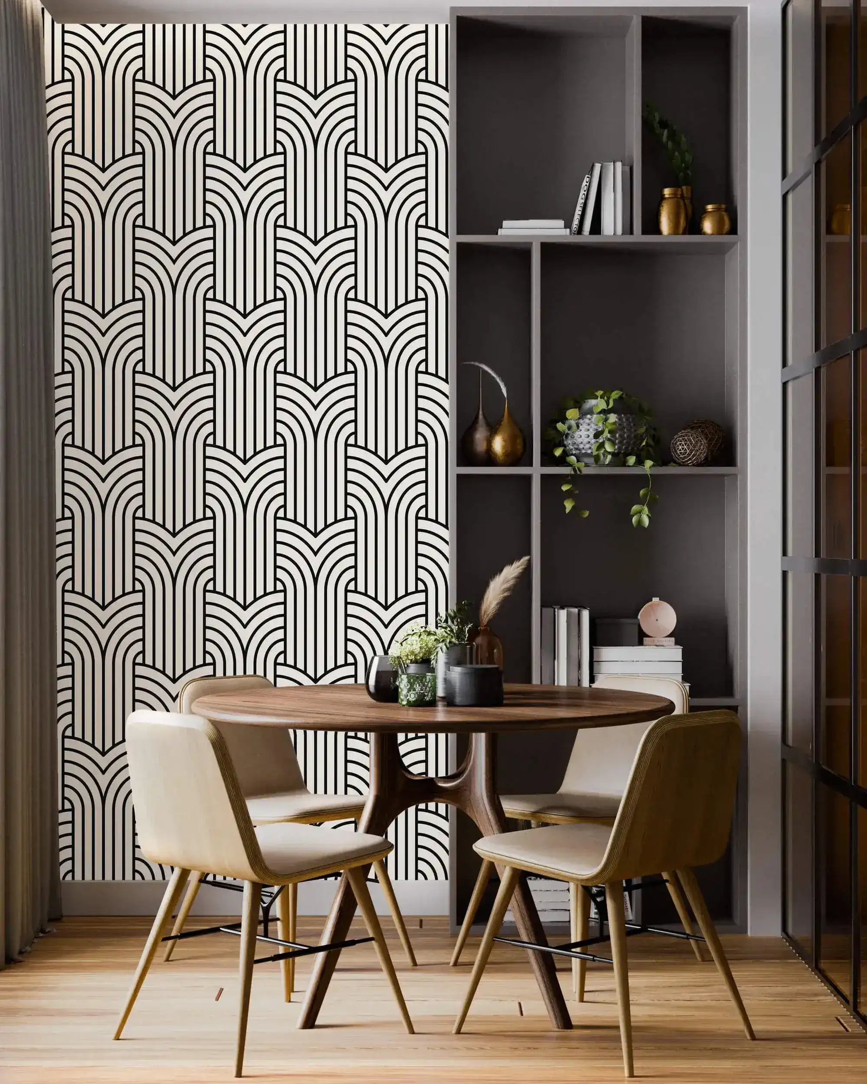 Vintage ornate outline wallpaper feature wall, black art deco arches on cream beside a round dining table
