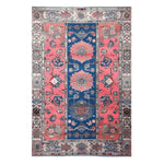 A stunning vintage radiance hand-knotted area rug featuring intricate Persian designs with a vibrant blue and red color palette. Perfect for adding a touch of elegance to living room spaces. Ideal as a living room rug in an 8x10 size, this vintage rug showcases timeless artistry and exquisite craftsmanship.