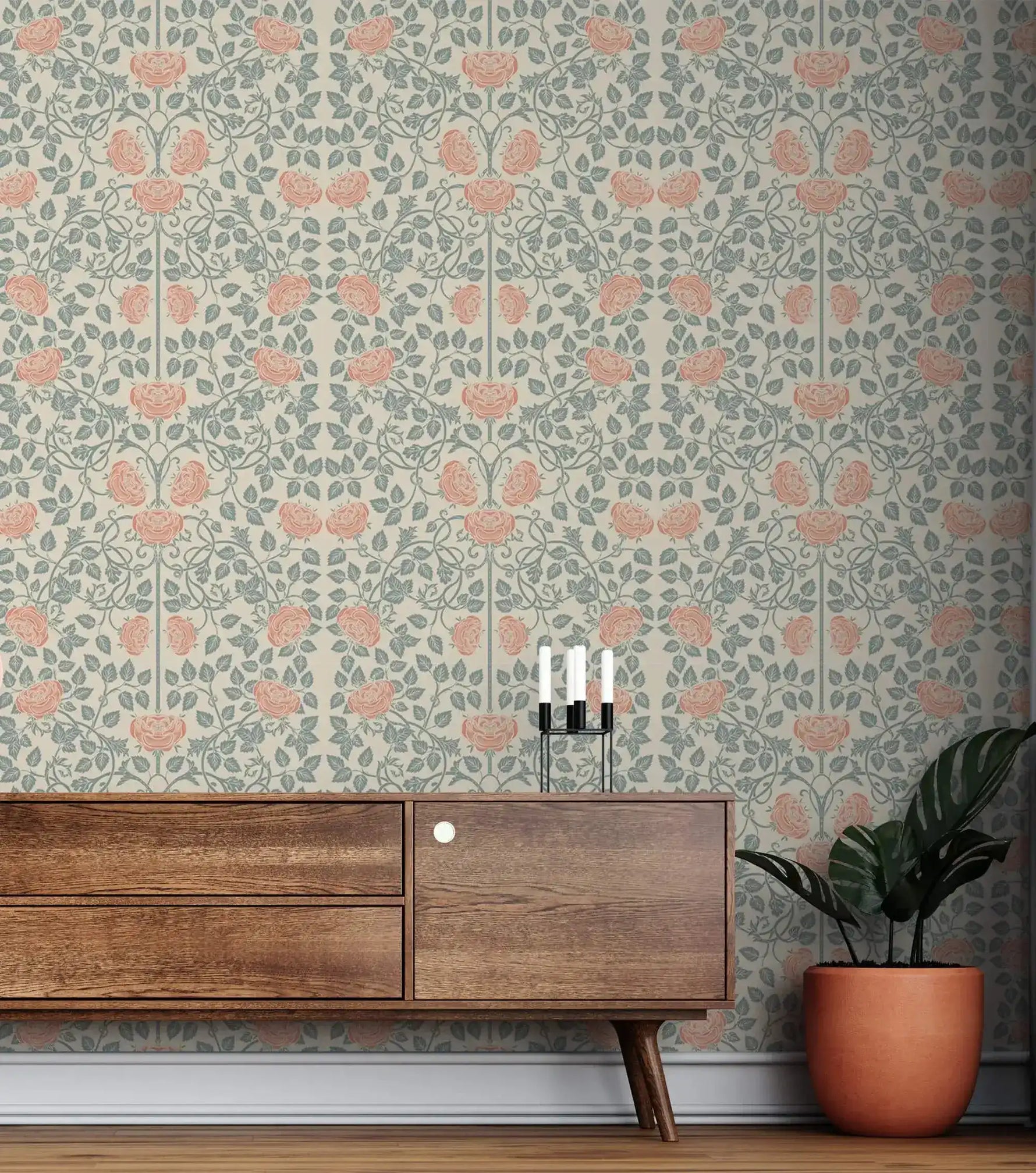 Vintage rose garden wallpaper above walnut sideboard, coral roses and sage vines on a cream ground