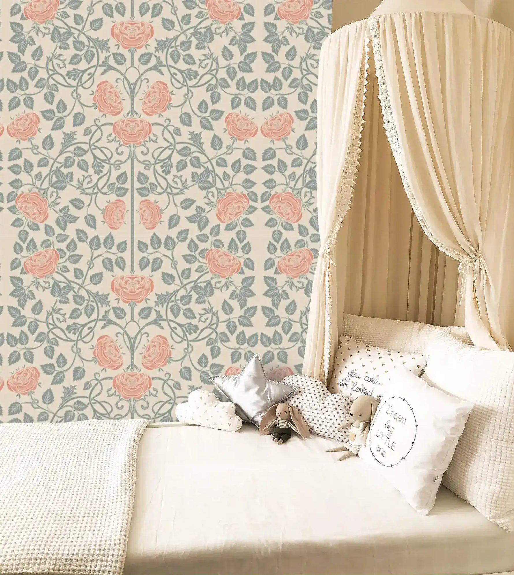 Vintage rose garden wallpaper in a nursery, coral roses on sage trellis vines beside a canopy bed