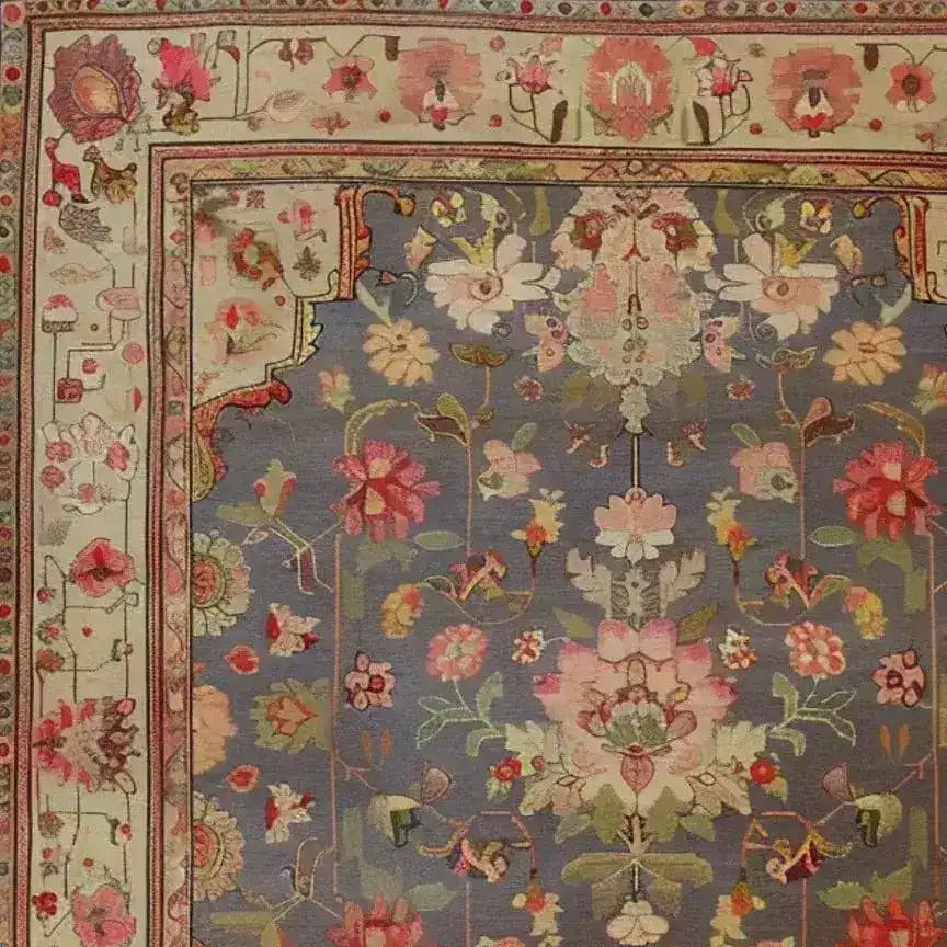 Close-up view of a Vintage Rose Vine Hand Knotted Area Rug, showcasing intricate floral patterns with vibrant colors on a soft background. Perfect for adding elegance to living room spaces, this 8x10 Persian-style rug features detailed floral motifs that enhance its vintage charm.