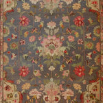 A beautifully detailed Vintage Rose Vine Hand Knotted Area Rug featuring an intricate floral pattern with vibrant colors on a soft background. This exquisite Persian rug is perfect as a living room area rug, especially in the popular 8x10 size, adding a touch of vintage elegance to any home decor.