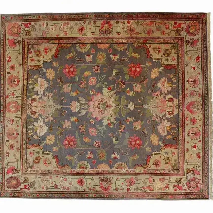 Top view of a Vintage Rose Vine Hand Knotted Area Rug featuring intricate floral patterns in shades of pink, green, and cream on a muted gray background. This elegant Persian-style rug is perfect for adding a touch of classic charm to living rooms, especially in sizes like 8x10, making it an ideal choice for those seeking a vintage floral rug design.