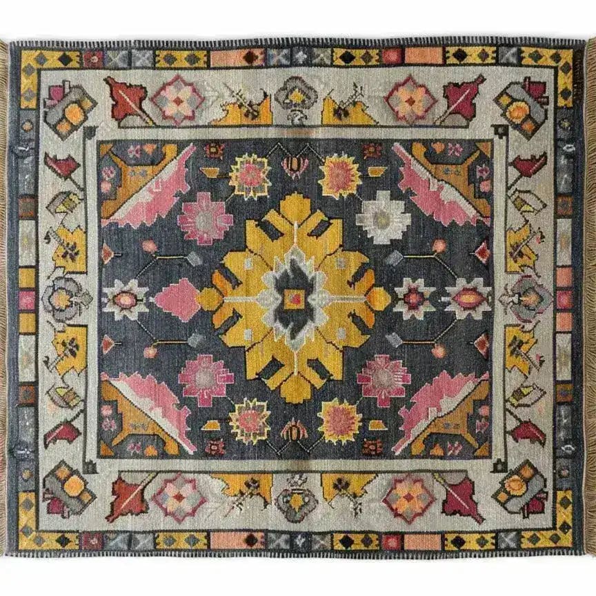 A beautifully intricate Vintage Tribal Hand Knotted Area Rug showcasing a vibrant design with bold geometric patterns. This Persian-inspired vintage rug features a rich palette of yellow, pink, and gray, making it a perfect large living room rug. Ideal for those seeking unique area rugs for their living space.