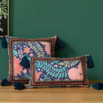 Vintage velvet floral throw pillows with tassels, featuring vibrant colors and intricate patterns, perfect for home decor.