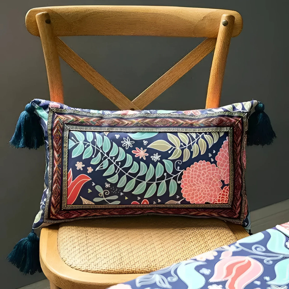 Vintage velvet floral throw pillow with tassels, featuring intricate botanical designs in vibrant colors.