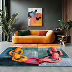 A vibrant and contemporary square area rug featuring an abstract chain design in bold colors, perfect for adding a modern touch to living rooms and dining rooms. This hand-tufted wool rug complements the decor with its eye-catching design and is ideal as a dining table rug or a statement piece in a dining room.