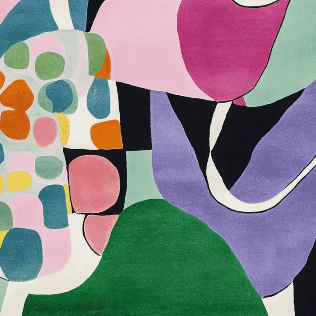 A vibrant and colorful area rug featuring abstract patterns in a mix of pink, purple, green, and orange hues. This hand-tufted wool rug showcases a contemporary design, perfect as a square area rug for living room spaces, adding a modern touch to any decor.