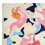 A vibrant square area rug featuring an abstract floral design in shades of pink, orange, blue, and black on a cream background. This wool rug is perfect for adding a contemporary touch to your living room decor.