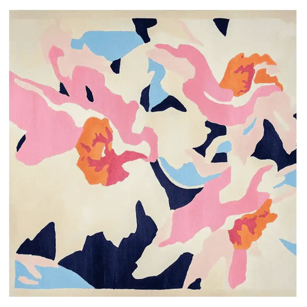 A vibrant, hand-tufted area rug featuring an abstract floral design in bold colors like pink, blue, and orange. This wool rug is perfect for contemporary living rooms, adding a splash of color and style as a square area rug.