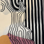 Close-up view of a contemporary area rug featuring bold, abstract black and white stripes with organic line patterns, perfect for adding a modern touch to any living room or bedroom. This hand-tufted wool rug incorporates subtle hues of pink and mustard, making it an eye-catching addition to your home decor.