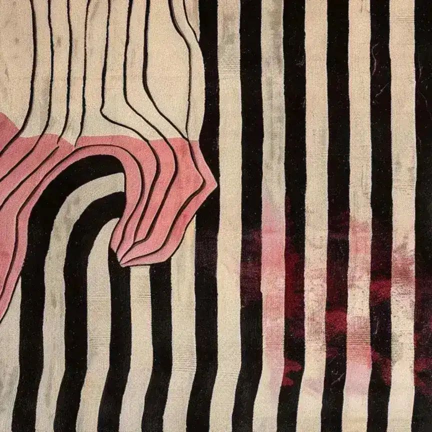 This vibrant area rug features a contemporary design with bold black and white stripes, accented by abstract pink shapes. Perfect for enhancing your living room or bedroom, this wool rug adds a modern touch to any space, making it ideal for those seeking unique area rugs for their living room or bedroom.