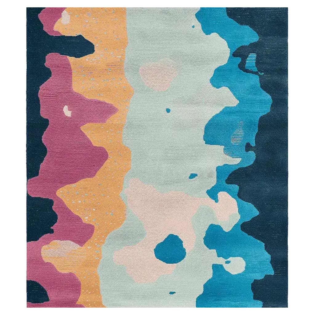 A vibrant hand-tufted area rug featuring an abstract design with bold colors including pink, orange, blue, and cream. This contemporary rug, made from high-quality wool, is perfect for adding a modern touch to any living room setting.