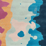 A vibrant area rug featuring a contemporary abstract design with bold colors like blue, pink, and orange. Perfect as an area rug for living room, this wool rug adds a modern touch to any space with its unique pattern.