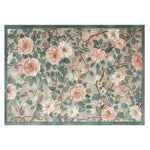 A beautifully detailed Wandering Bloom Trail Hand Tufted Area Rug showcasing a lush floral pattern with pastel pink and green hues. Ideal for enhancing living room decor, this wool rug adds elegance and warmth as one of the finest floral rugs available.