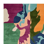 Top view of a Wandering Form Hand Tufted Area Rug showcasing a vibrant abstract design with rich colors like green, purple, blue, and orange. This large living room wool rug is perfect as a contemporary square area rug, ideal for adding a touch of modern art to your space.