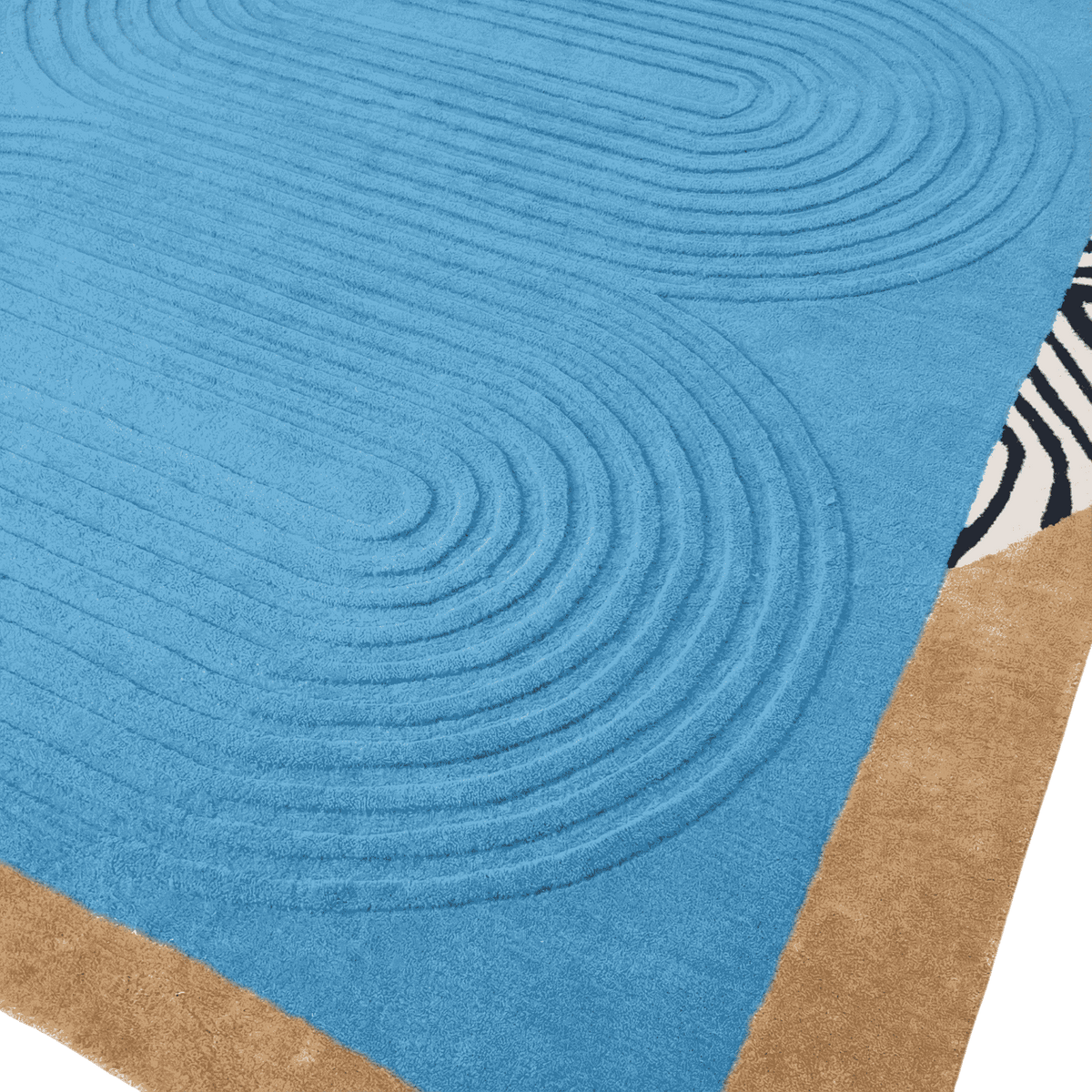 Close-up of a blue textured rug with concentric circular pattern rug