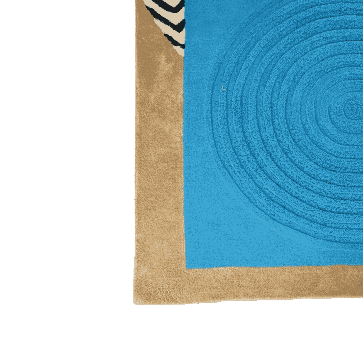 Corner of a blue and beige rug with circular pattern