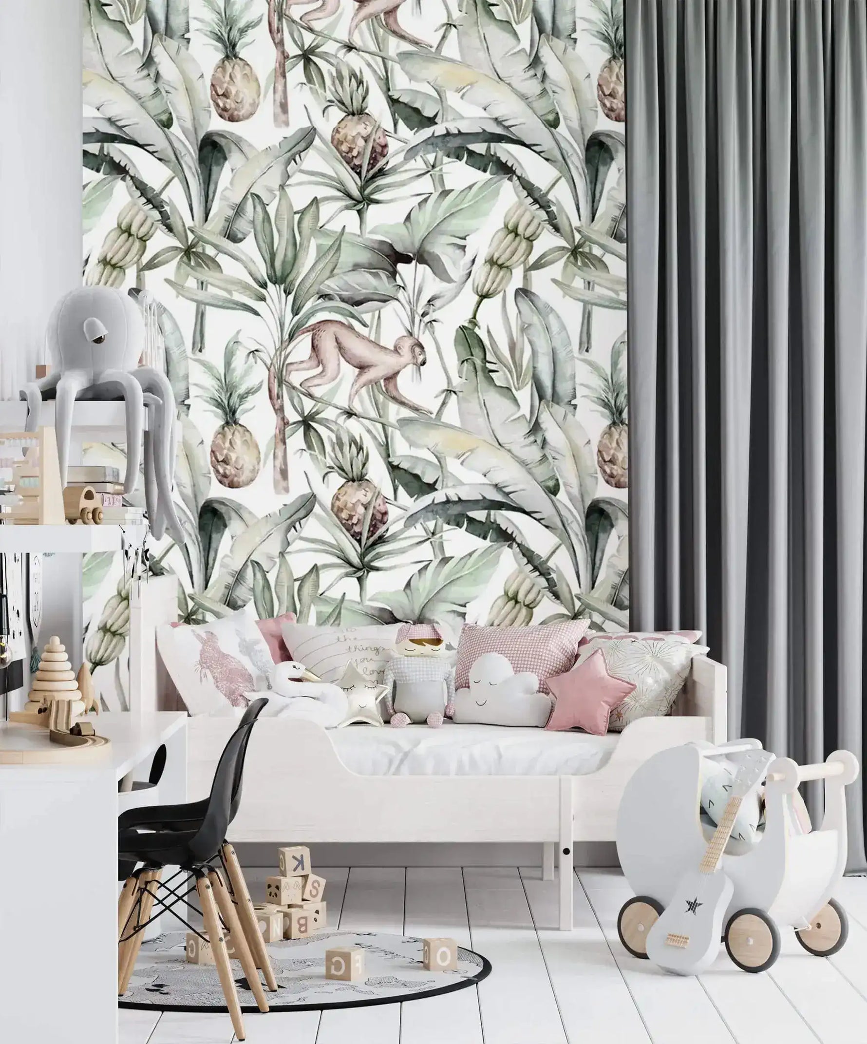 Watercolor tropical jungle wallpaper in kids room with toddler bed, pink cushions and toy pram