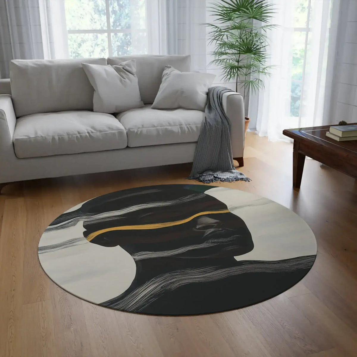 Waves of Identity Round Rug on light wood floor in bright living room with white sofa, plant and dark face-and-waves design