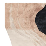 Close-up view of the Wavy Land Narrative hand-tufted area rug, showcasing its elegant abstract design in soft beige and black tones. Perfect as a wool rug for large living rooms, this contemporary rug adds a touch of sophistication to any space.