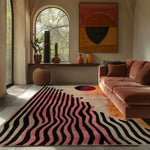 A stylish area rug with wavy pink and black lines, perfect for a contemporary living room or dining room setting. The hand tufted wool rug adds a touch of elegance, complementing both formal dining room rugs and modern dining room carpets.