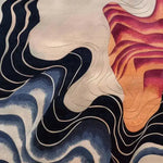 Explore the elegance of this Area Rug with a contemporary design, featuring a blend of bold, wavy patterns in shades of blue, beige, and orange. Perfect for enhancing large living room spaces, this hand-tufted wool rug adds a stylish touch to your decor. Ideal for those seeking large area rugs that combine modern aesthetics with comfort.