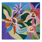 A vibrant, square area rug featuring a whimsical floral design in bold colors. This contemporary wool rug is perfect for adding a splash of color to any large living room. The intricate, hand-tufted pattern showcases abstract flowers in shades of blue, green, pink, and orange, making it an ideal choice for rugs for living room settings.