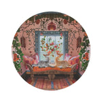 Whimsy Garden Lounge round rug flat view: illustrated pink room scene with two cats on settee, lush vines, flowers, and window view