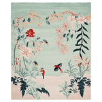 This hand-tufted area rug, ideal for living rooms, showcases a whimsical garden scene with vibrant floral designs and birds. Made from high-quality wool, this wool rug adds a touch of nature and elegance to any living space.