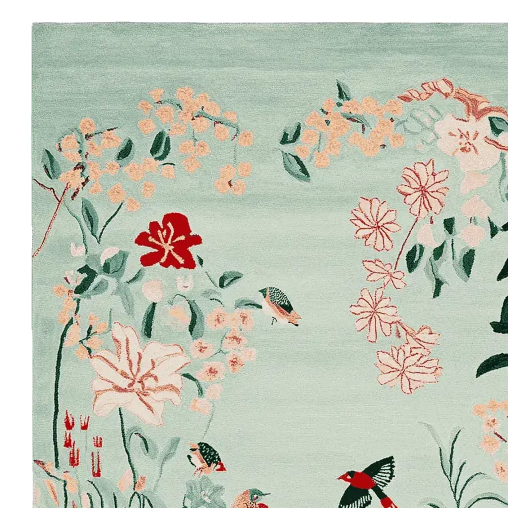 A whimsical garden-themed area rug featuring a hand-tufted design with vibrant floral patterns and birds in soft pastel colors. This wool rug is perfect for adding a touch of nature to your living room decor. Ideal for those seeking unique area rugs for living room spaces.