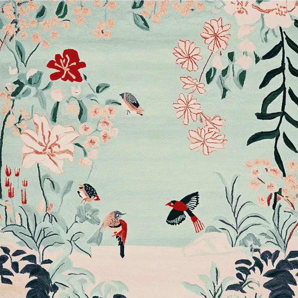 A whimsical garden-themed area rug hand-tufted from wool, featuring vibrant floral patterns and colorful birds. This area rug is perfect for adding a touch of nature to your living room decor.