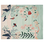 A beautifully hand tufted wool rug featuring a whimsical garden design with vibrant birds and floral patterns. This area rug is perfect for adding a touch of elegance to any living room. The pastel colors and intricate details make it an ideal choice for those seeking stylish area rugs for living room decor.