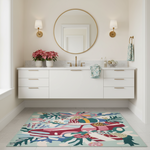 Bathroom with a colorful rug featuring marine life design, white vanity, and decorative elements.