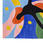 A vibrant, hand-tufted area rug featuring an abstract design with bold colors like blue, pink, and orange. This contemporary wool rug is perfect for adding a splash of color to your living room. Ideal as a square rug or living room rug in an 8x10 size, this square area rug combines modern artistry with practical elegance.