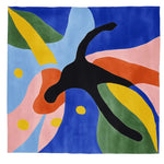 Top view of a vibrant, hand-tufted Whimsy Motion Patch wool area rug featuring an abstract design with bold colors like blue, green, yellow, pink, and black. Perfect for modern living rooms, this contemporary square rug adds artistic flair and is ideal as a living room rug in an 8x10 size.
