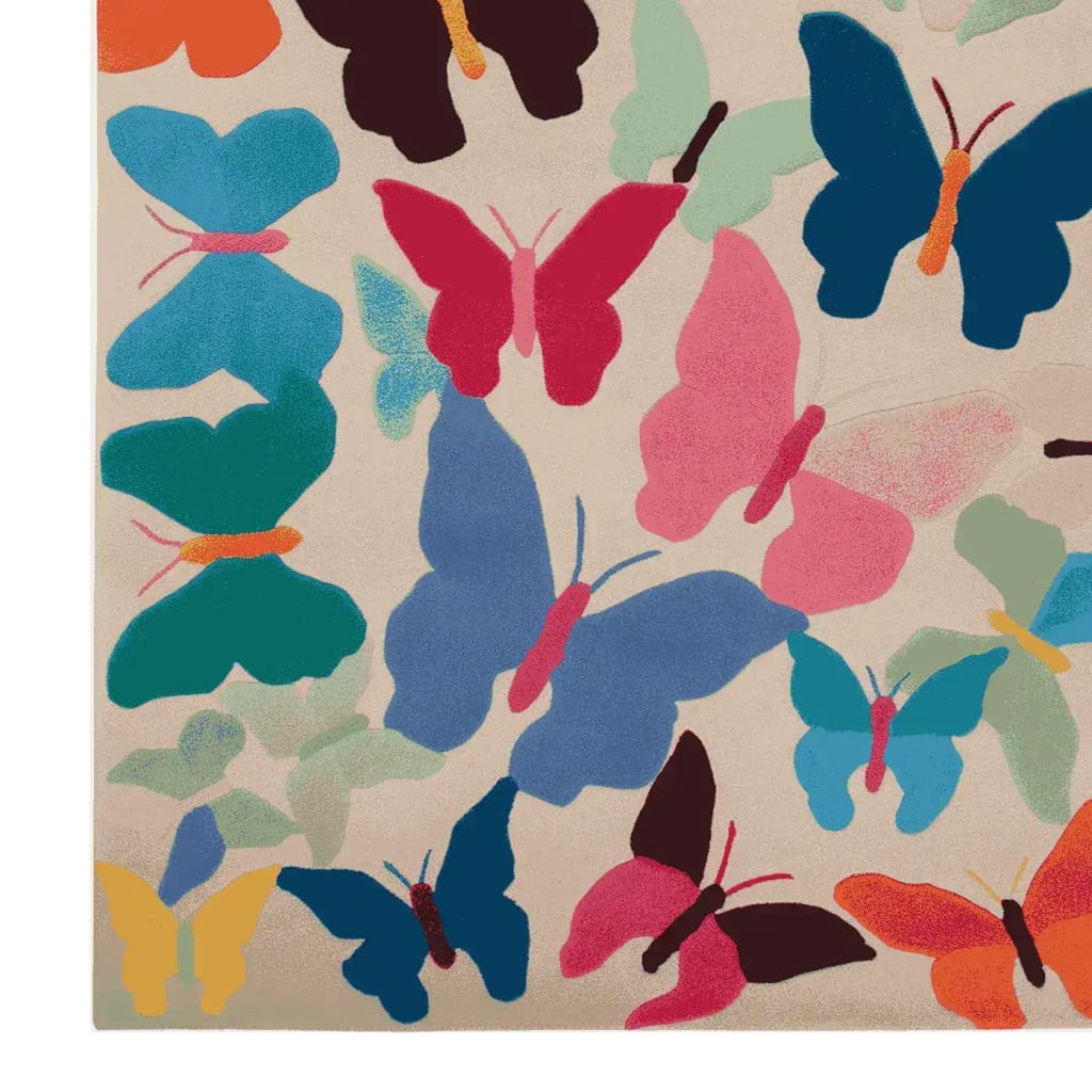 Colorful butterfly design on Whirl of Wings Hand Tufted Area Rug, showcasing vibrant wool patterns perfect for living room decor.