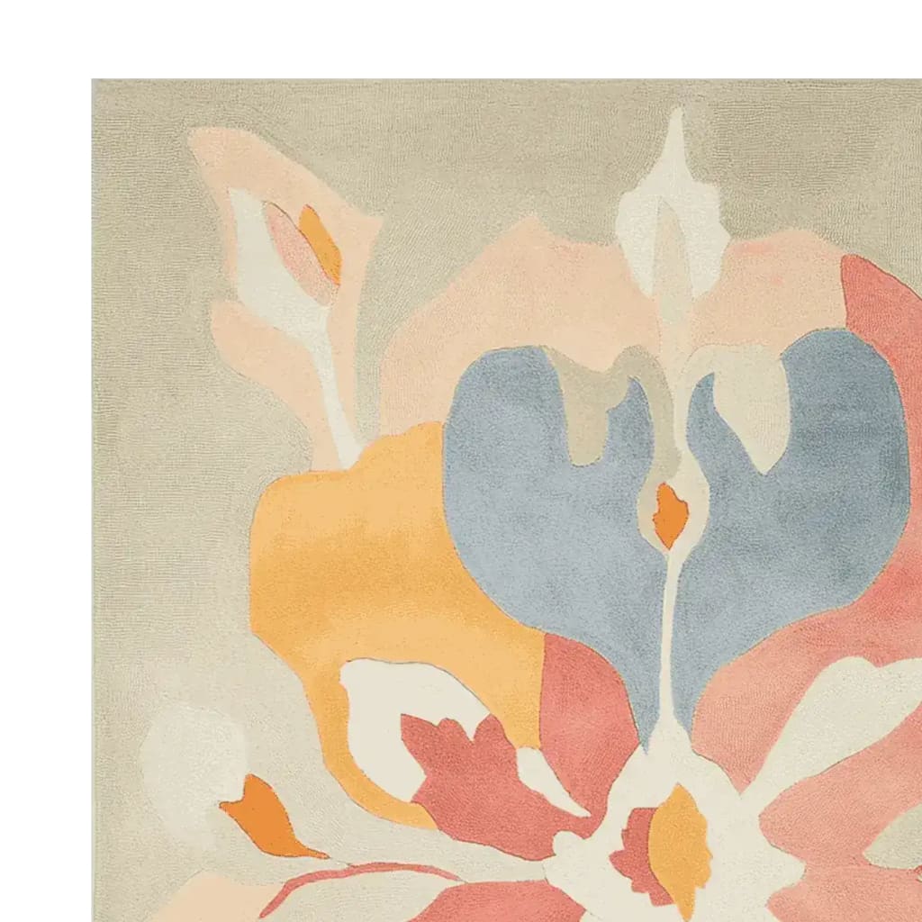 Close-up of the Whispering Bloom Flow Hand Tufted Area Rug, showcasing its vibrant abstract floral design in pastel shades. This wool rug is an ideal contemporary rug for adding a splash of color to any living room. Perfect for those looking for stylish area rugs for living room decor.
