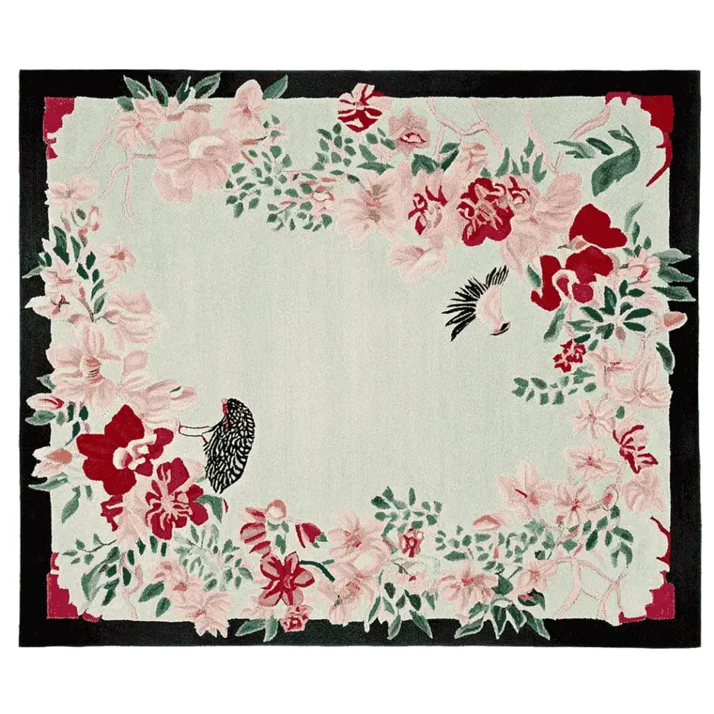 This beautiful area rug, titled 'Whispering Bloom Tale Hand Tufted Rug', showcases a stunning floral design with intricate pink and red blossoms set against a soft backdrop. Ideal for large living rooms, this wool rug adds a touch of elegance and warmth to any space.