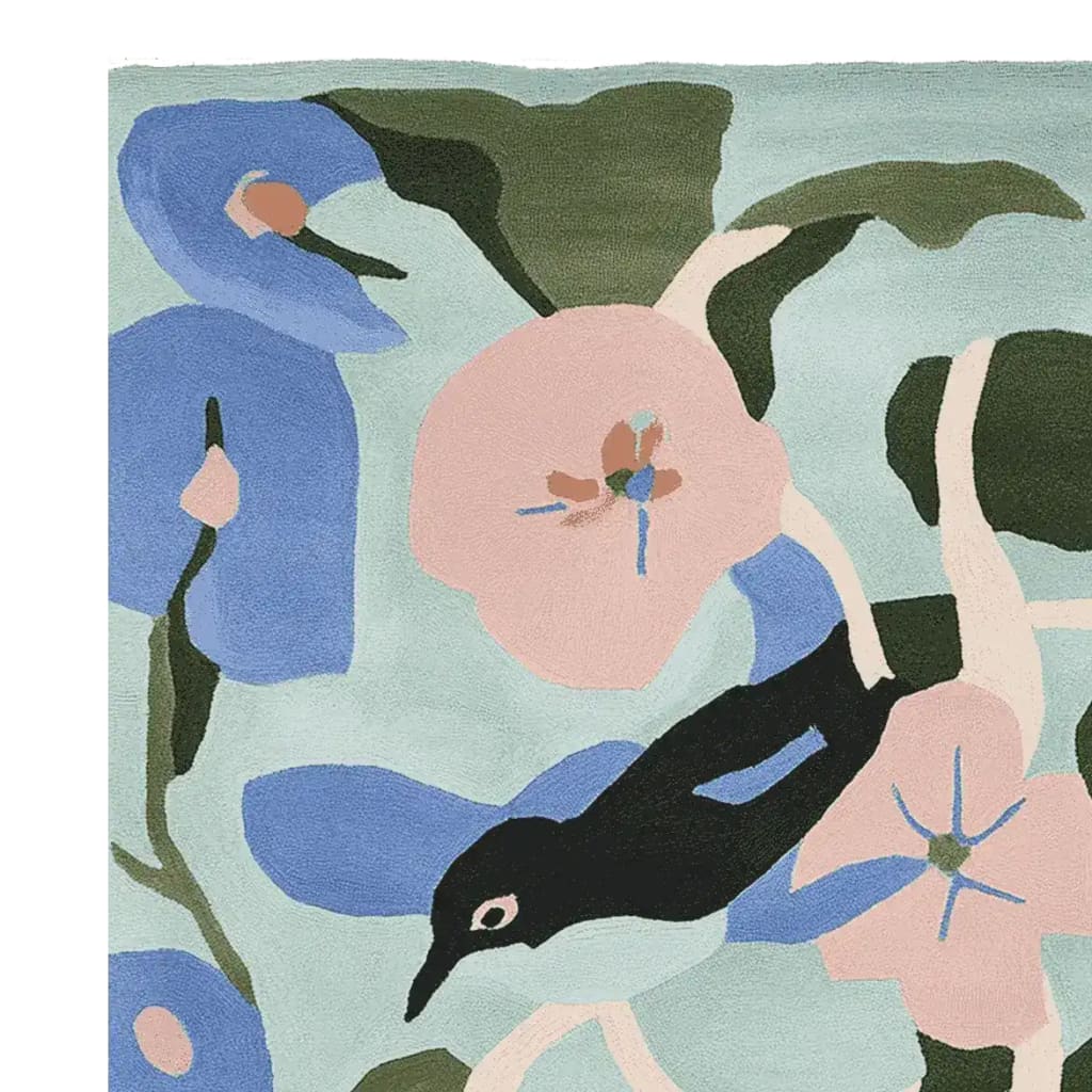 A close-up view of the Whispering Garden Muse Hand Tufted Area Rug showcasing a vibrant contemporary design. This wool rug features a playful bird motif amidst abstract floral patterns in soft pastel colors, perfect for adding a creative touch to rugs for living room spaces.