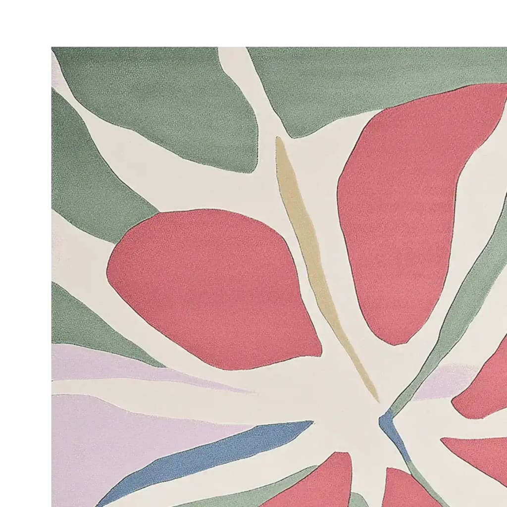 A vibrant and contemporary area rug showcasing an abstract floral design with bold red, green, and cream hues. This wool rug is perfect for adding a splash of color to any living room, offering a modern touch to your space.