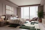 Modern bedroom with a large bed, abstract rug, armchair, and large windows.