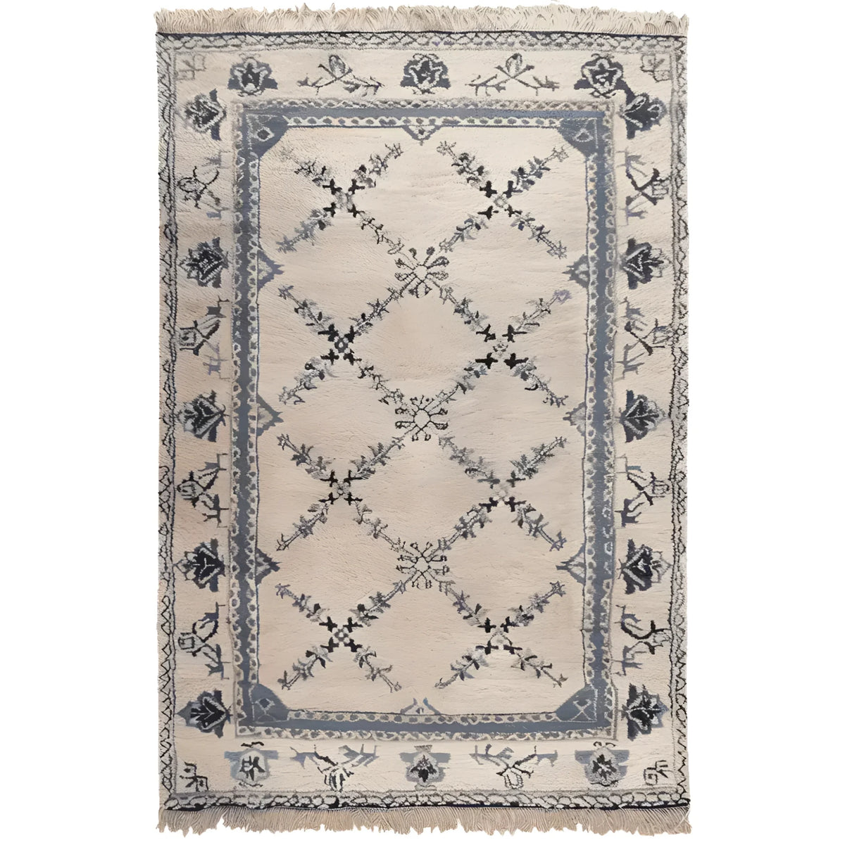 The Whispering Vines Hand Knotted Rug is a stunning area rug featuring intricate vine patterns in shades of blue and black on a beige background. This wool rug, perfect for adding a touch of elegance to your living room, combines traditional craftsmanship with a vintage charm. Ideal as an area rug for living rooms, it brings both style and comfort to any space.