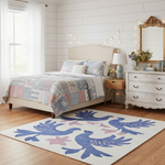 Bedroom with a bed, nightstands, and a dresser with decorative rug.