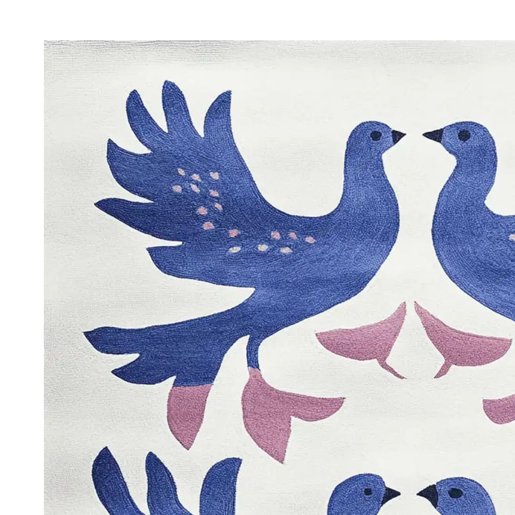 A stunning area rug showcasing a contemporary design with two blue birds in a symmetrical pattern. This wool rug features intricate details and soft pink accents against a creamy background, perfect for enhancing any living room. Ideal as a square area rug or for living room rugs 8x10 displays.