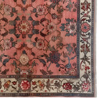 A beautifully detailed area rug featuring a rich floral pattern in warm hues, perfect for enhancing living room decor. This knotted wool rug, titled 'Whispers of Antiquity', showcases intricate designs with a classic touch, ideal for those seeking elegant floral rugs.