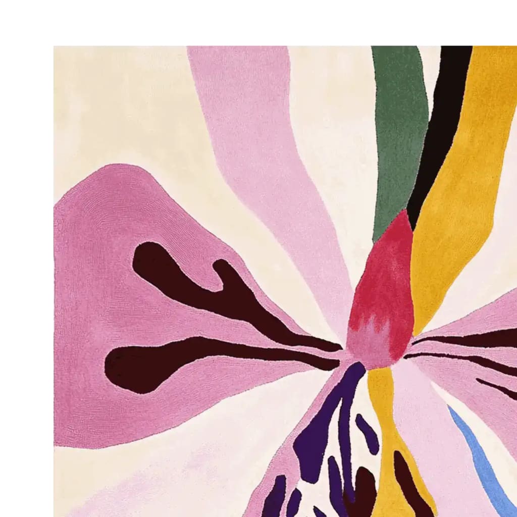 Close-up view of the Whispers of Flora Hand Tufted Rug, showcasing its vibrant abstract floral design. This area rug is perfect for adding a splash of color to your living room. Ideal as a living room rug 8x10, this wool rug combines contemporary style with comfort, making it a standout piece in rugs for living room collections.