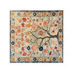 Whispers of Spring Knotted Wool Rug featuring an elegant floral pattern with vibrant blooms. This large area rug, perfect for a living room, measures 8x10 and is crafted from high-quality wool, showcasing intricate detailing and a harmonious color palette.