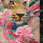 A vibrant area rug featuring an intricate hand-tufted design of a leopard surrounded by lush pink flowers and green foliage. This wool rug showcases a striking blend of colors, making it an ideal floral rug for living room decor. The square area rug offers a unique artistic touch, combining wildness and elegance in its abstract pattern.