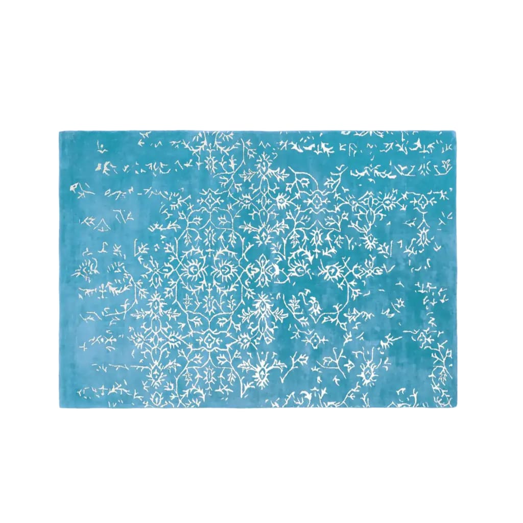 Top view of the White Bloom Elegant Hand Tufted Viscose Area Rug in Blue, featuring an intricate floral pattern. Ideal for adding a touch of sophistication to large living rooms or bedrooms. This vintage-inspired wool rug is perfect for those seeking elegant living room rugs sized 8x10.